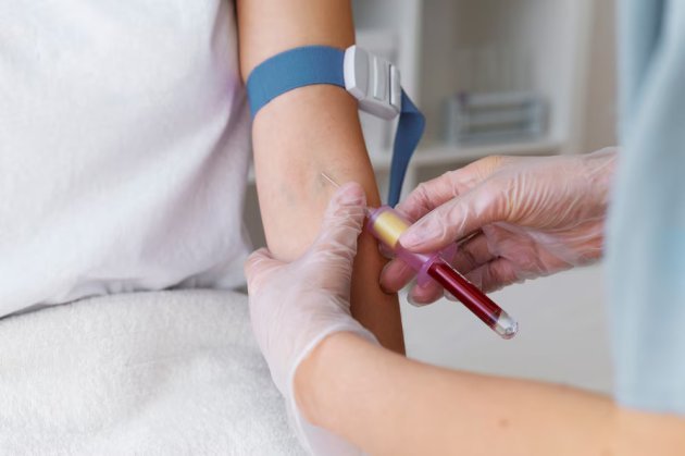 high-angle-health-professional-drawing-blood_23-2149404714