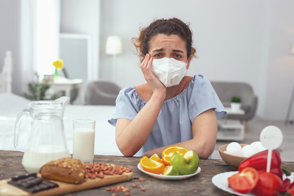 impossible-choice-young-upset-looking-woman-feeling-unfortunate-while-suffering-from-multiple-food-allergies-causing-her-discomfort-limiting-her-food-choices